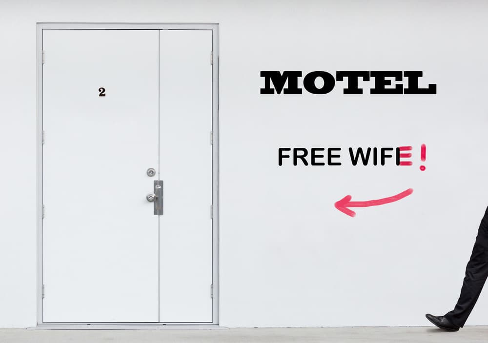 Free Wife Motel Door by Jacqueline Hammer — canvas wall art