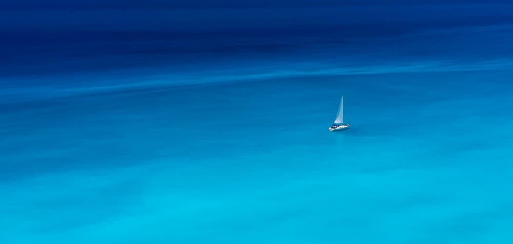 Sailing The Turquoise Sea by Stefan Hogea — canvas wall art