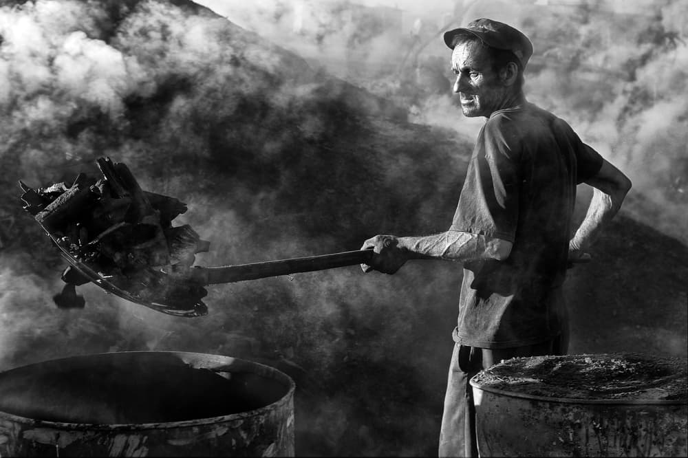 Man Working Charcoal by Zoran Toldi (EFIAP AZSF) — canvas wall art