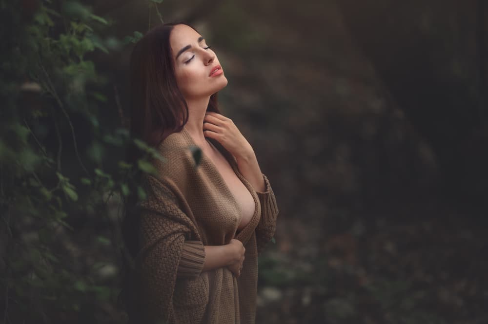Serene Woman in Nature by Evgeny Loza — canvas wall art