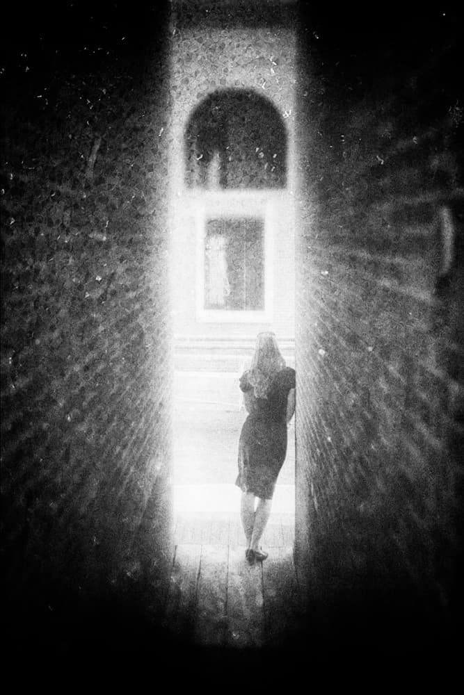Woman In Arched Light by Enrico Facchetti — canvas wall art