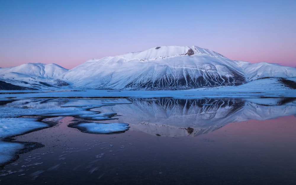 Majestic Winter Mountain Reflection by Sergio Barboni — canvas wall art