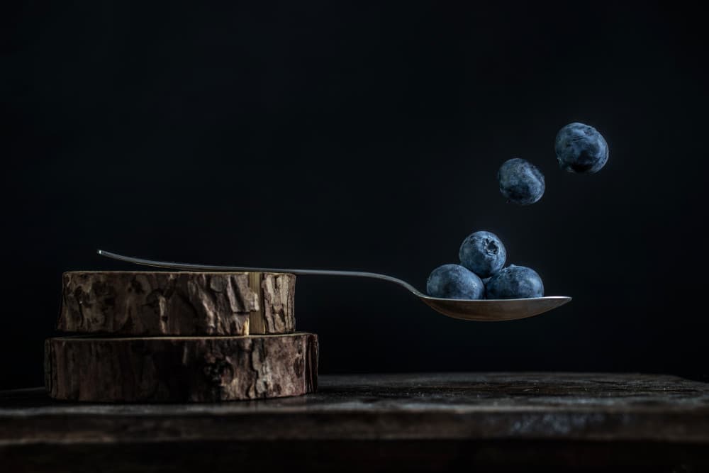 Floating Blueberries by Katarzyna Gritzmann — canvas wall art