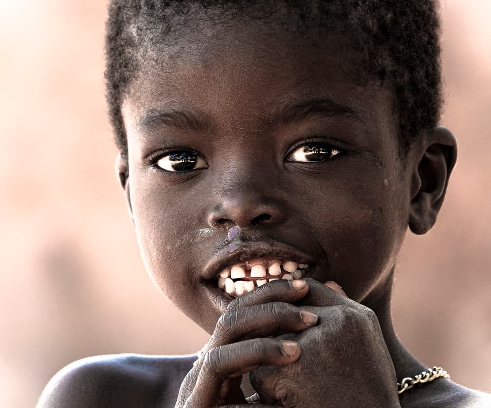 Smiling African Child by Elena Molina — canvas wall art