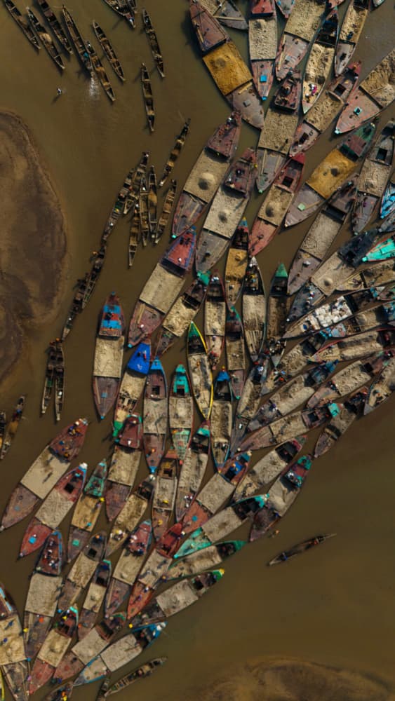 Busy River Sand Boats by Md. Arifuzzaman — canvas wall art