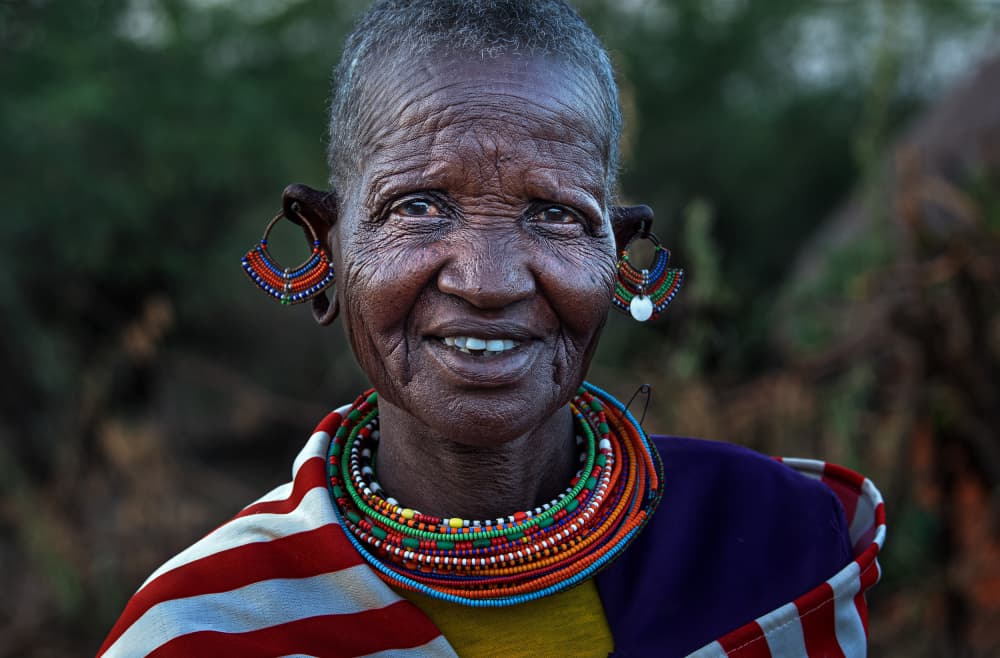 Smiling African Elder by Joxe Inazio Kuesta Garmendia — canvas wall art