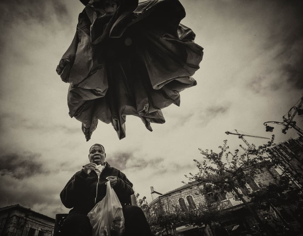 Man Under Fabric Sky by Yuri Shepelev — canvas wall art