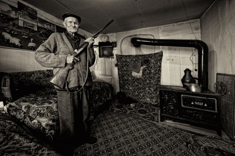 Rustic Man with Rifle by nebula — canvas wall art