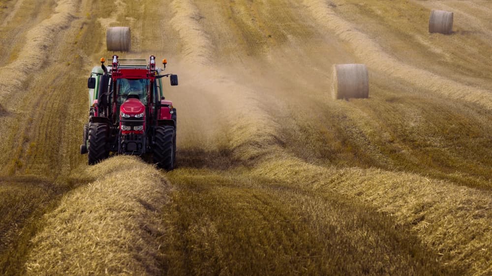Tractor in Golden Field by Francis Wilson — canvas wall art