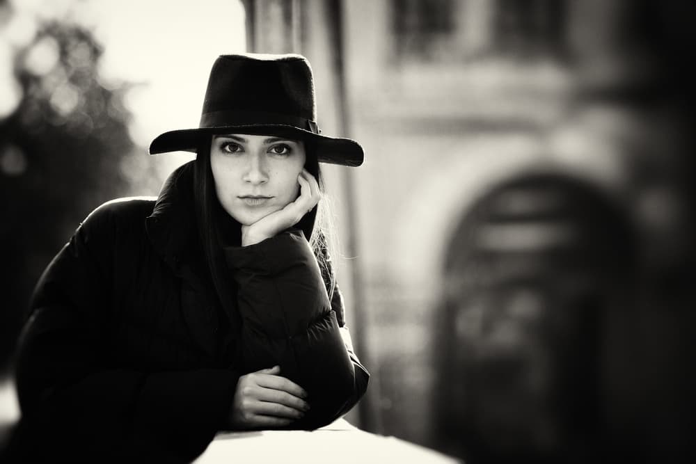 Thoughtful Woman In Hat by Mihai Bogdan R — canvas wall art