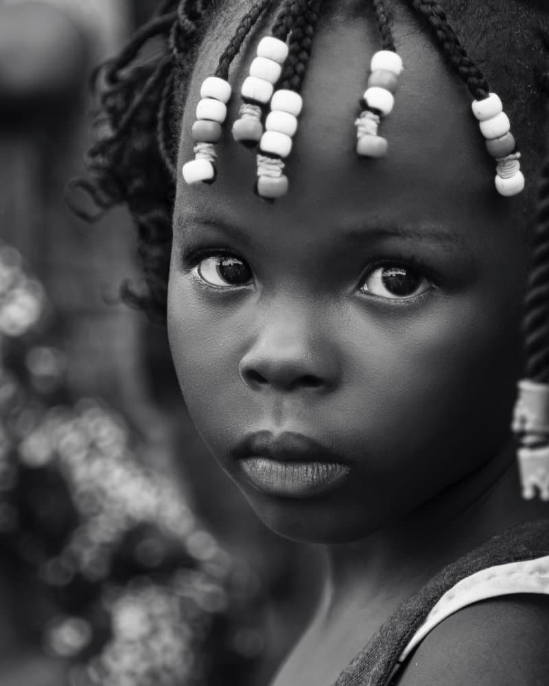 Young African Gaze by Emel Sefer — canvas wall art
