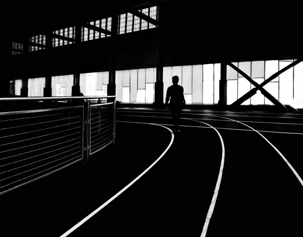 Running Track Silhouette by Jasmine Zhang — canvas wall art