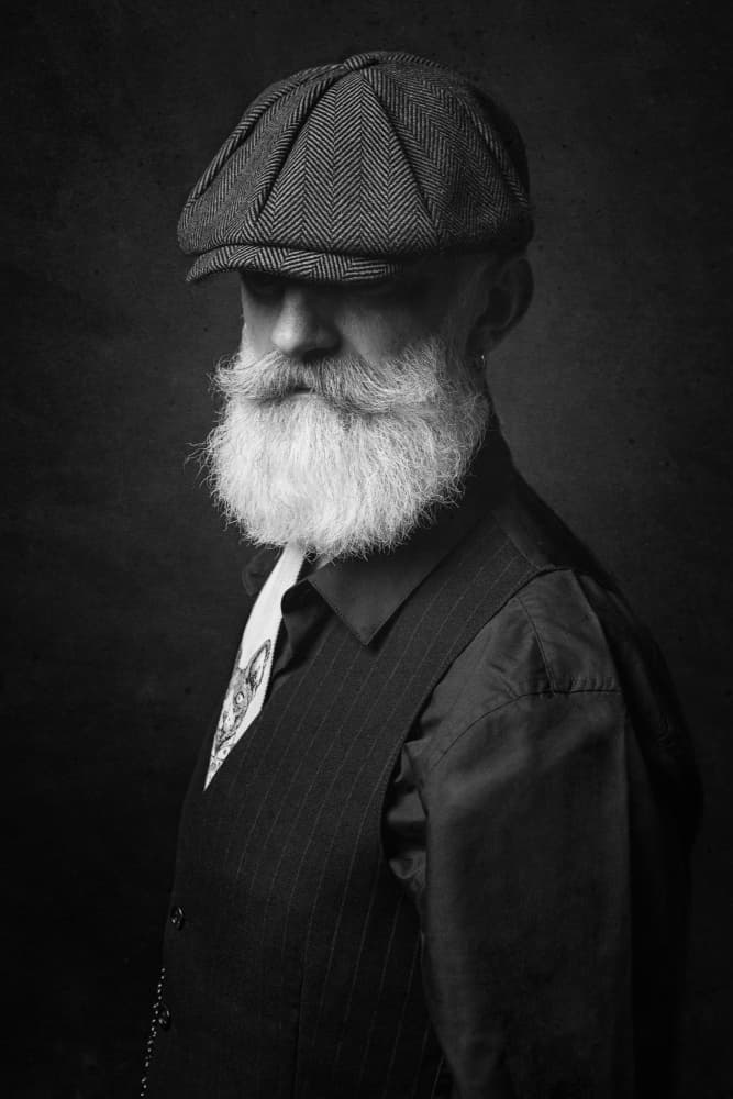Dapper Man Flat Cap by Luigi Greco — canvas wall art