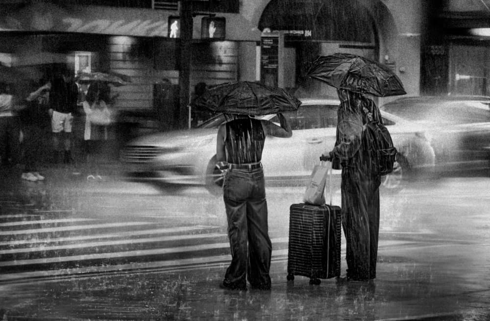 Rainy City Travelers by Kenneth-Wei Zeng — canvas wall art