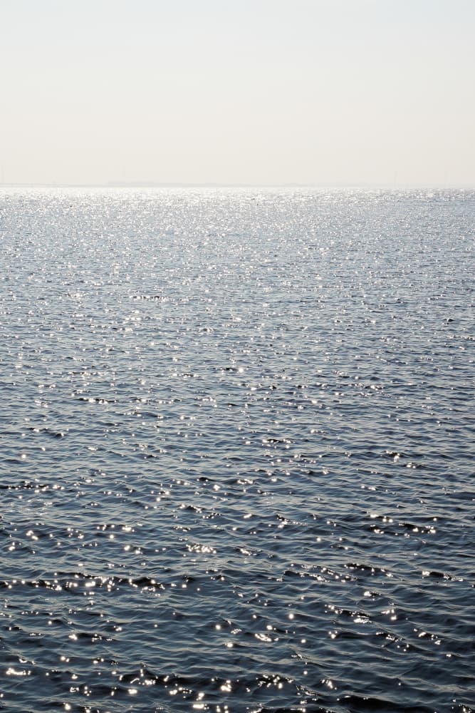 Shimmering Ocean Reflections by Henrike Schenk — canvas wall art