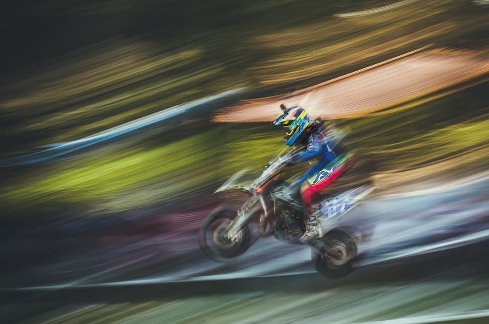 Supermoto Race Action by Carlos Gonzalez — canvas wall art