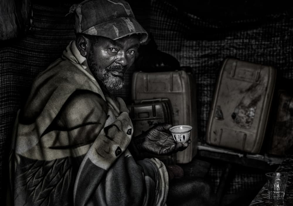 Intense Gaze with Coffee by Joxe Inazio Kuesta Garmendia — canvas wall art