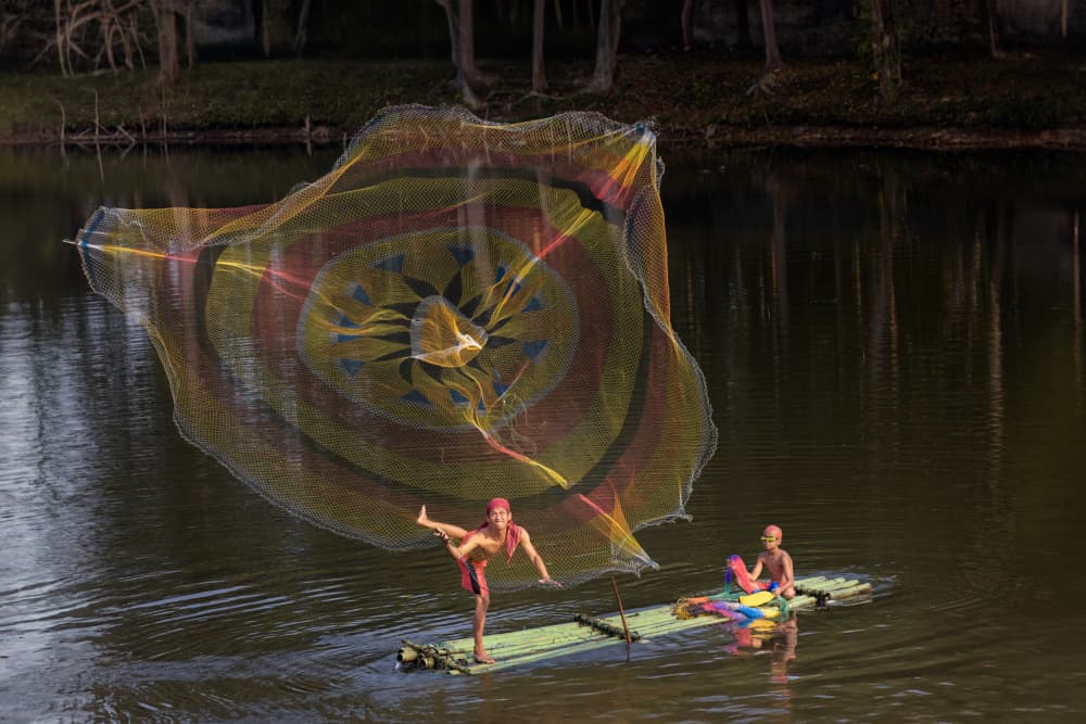 Casting a Colorful Net by Lisdiyanto Suhardjo — canvas wall art