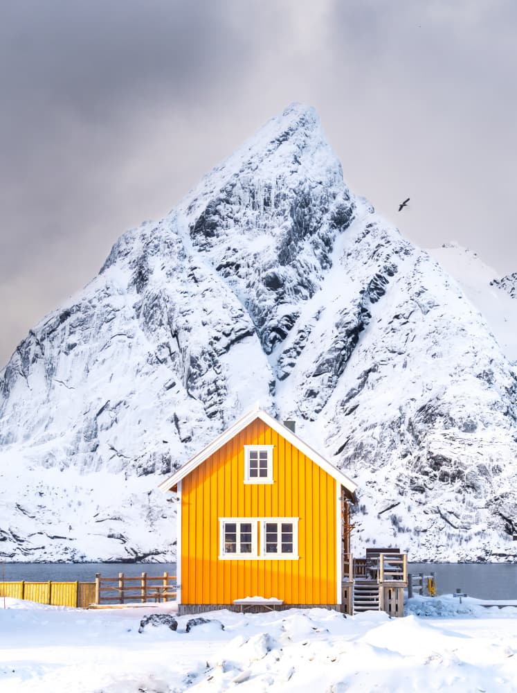 Yellow House Snowy Peak by Gilad Topaz — canvas wall art