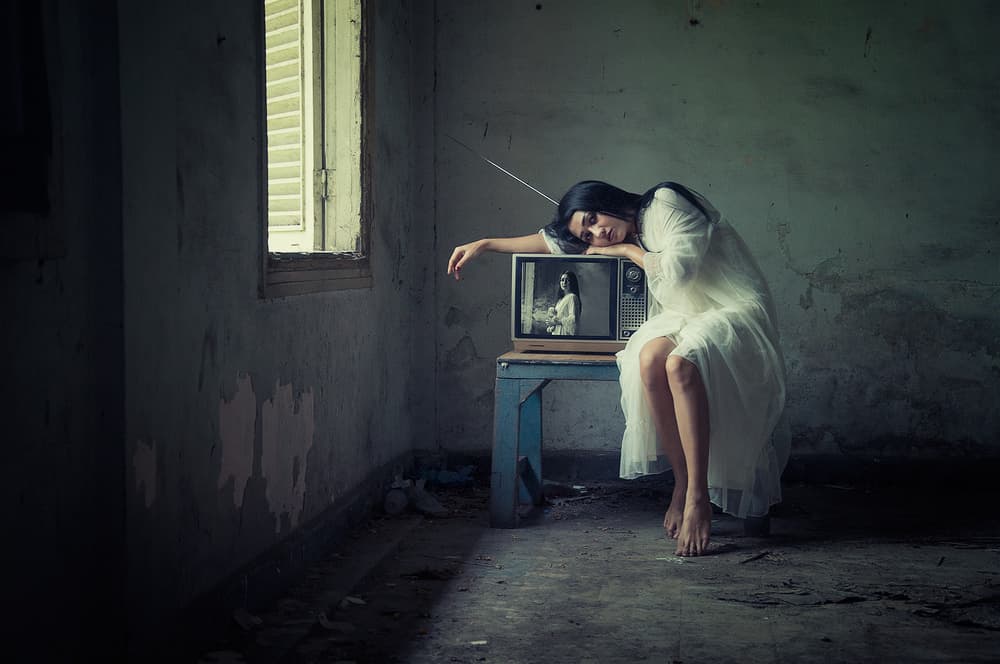 Melancholy Woman Vintage TV by Joey Bangun — canvas wall art