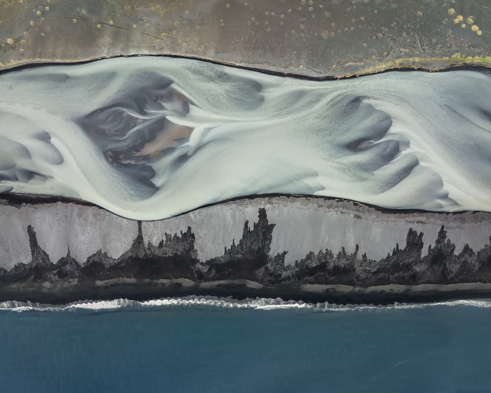 River Meets Black Beach by Shenshen Dou — canvas wall art