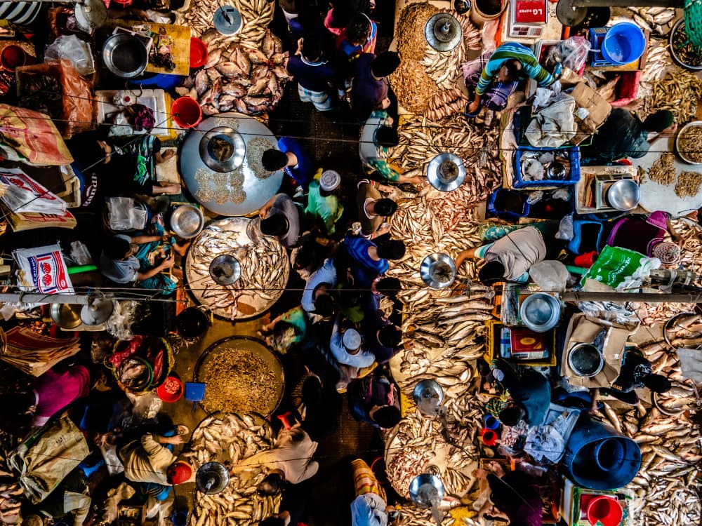 Bustling Fish Market by Rakibul Alam Khan — canvas wall art