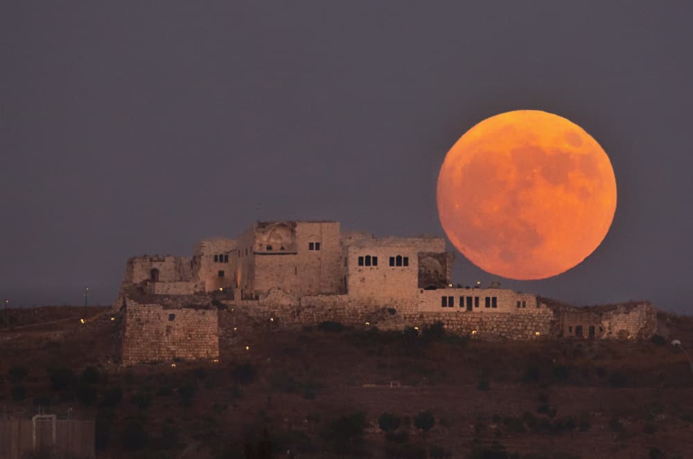 Orange Moon Castle Night by Zipi Raviv — canvas wall art