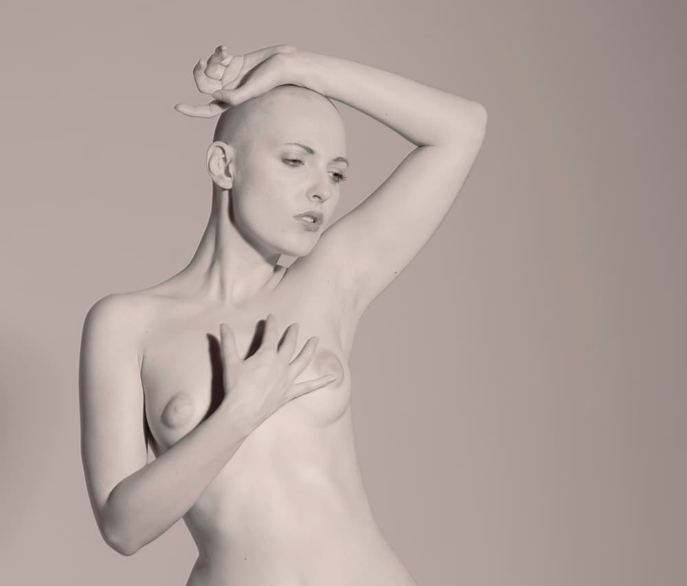 Contemplative Bald Woman by Ari Kordonsky — canvas wall art