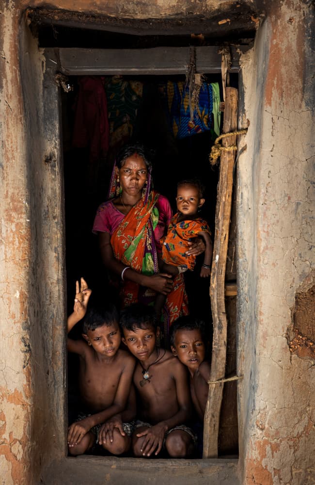 Indian Family in Doorway by Prithul Das — canvas wall art