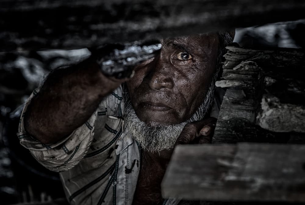 Elderly Man's Intense Gaze by Joxe Inazio Kuesta Garmendia — canvas wall art