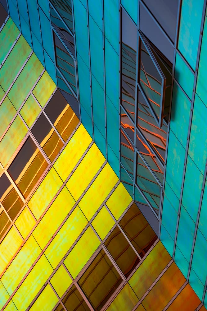 Vibrant Glass Facade by Greetje van Son — canvas wall art