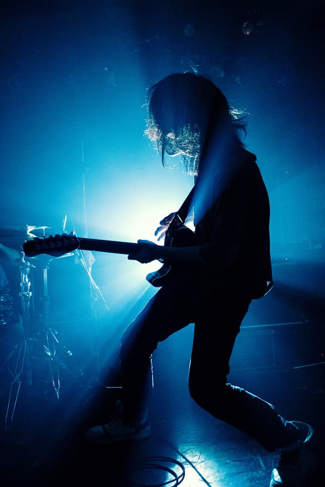 Guitarist Under Blue Light by Kenji Nakamatsu — canvas wall art