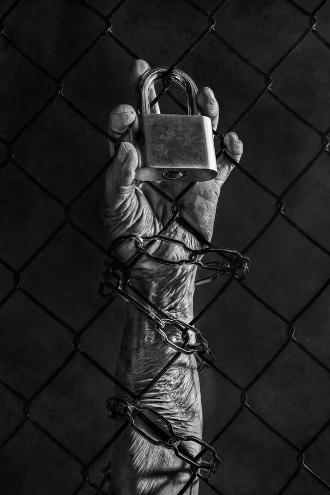 Chained Hand and Lock by Stephen Clough — canvas wall art