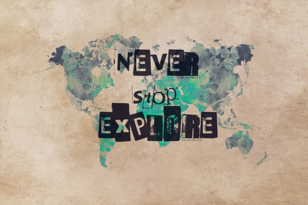 Never Stop Explore World Map by Justyna Jaszke — canvas wall art