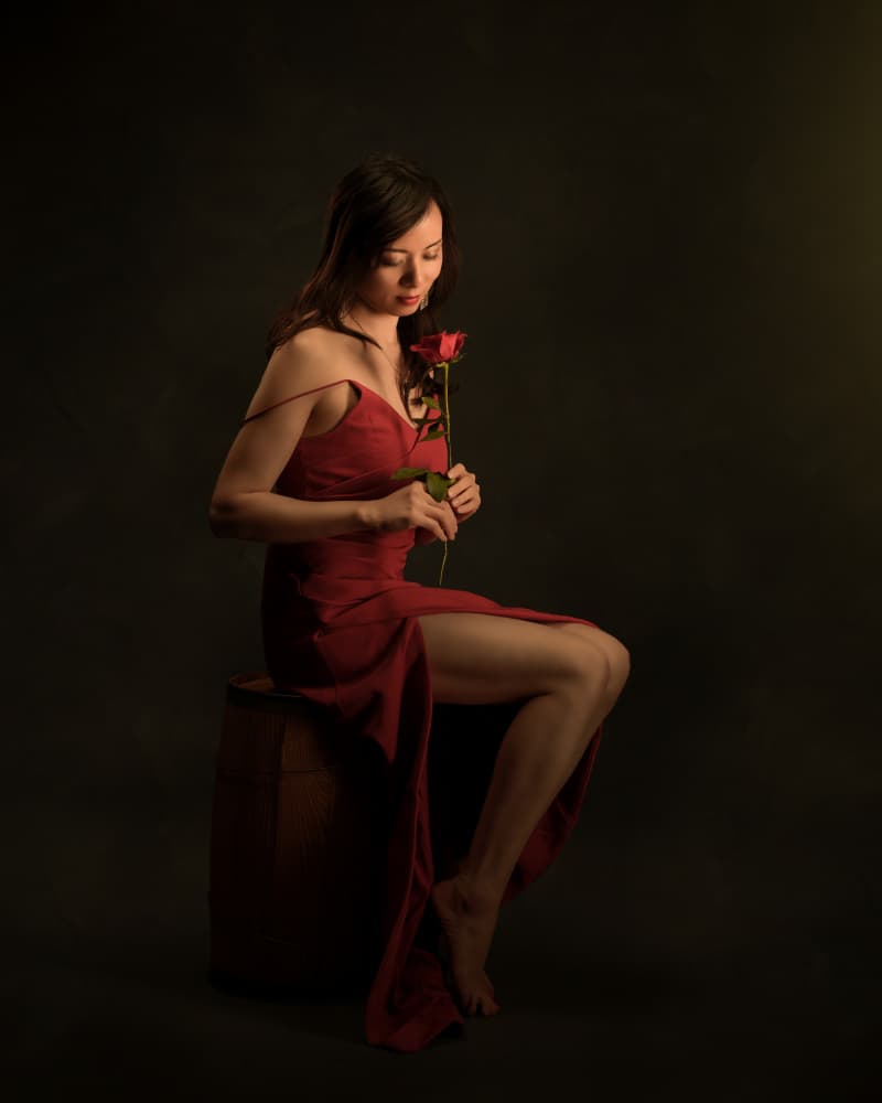 Pensive Woman Red Rose by Rob Li — canvas wall art