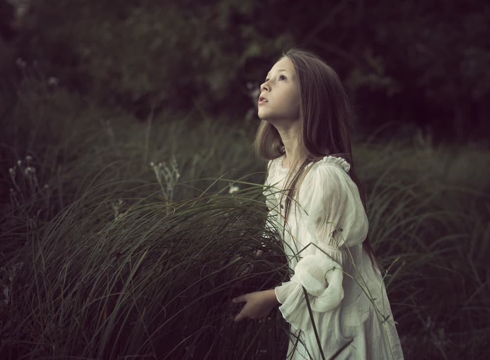Dreamy Girl Looking Up by Elena Karagyozova — canvas wall art