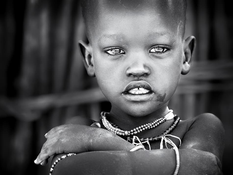 Striking African Child Eyes by Izidor Gasperlin — canvas wall art