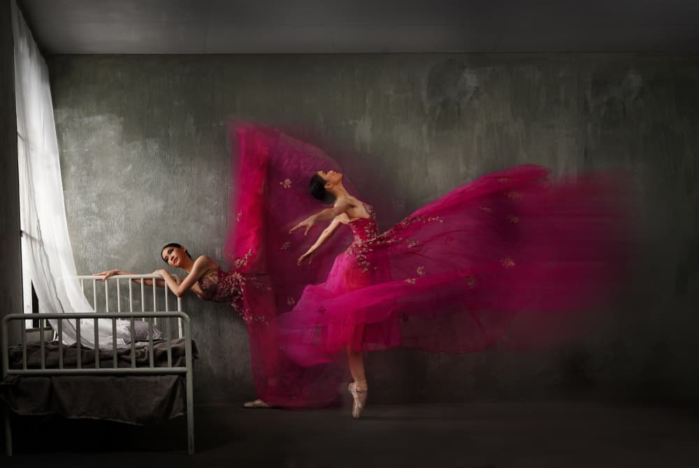 Duo red gown ballerinas by Rawisyah Aditya — canvas wall art