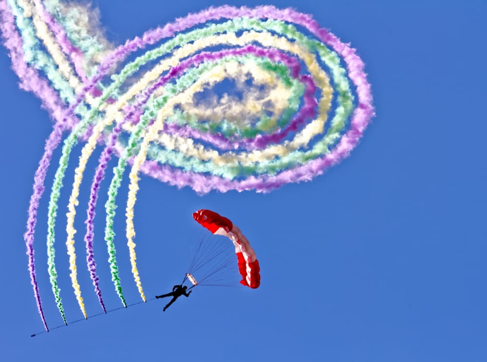 Skydiver Colorful Smoke Trails by Thomas McCleave — canvas wall art