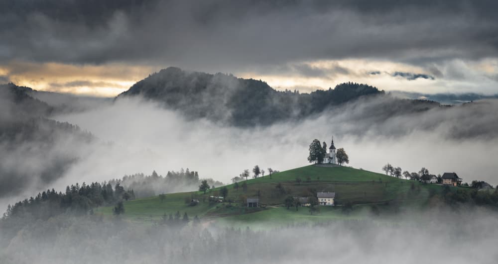 Misty Hilltop Church by Ivo Mateju — canvas wall art
