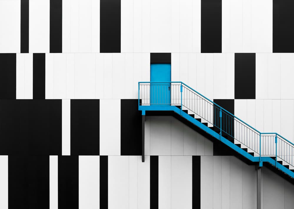 Blue Stairs on Graphic Wall by Alfonso Novillo — canvas wall art