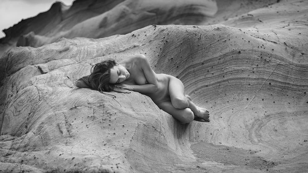 Nude Woman Rock Serenity by Joan Gil Raga — canvas wall art
