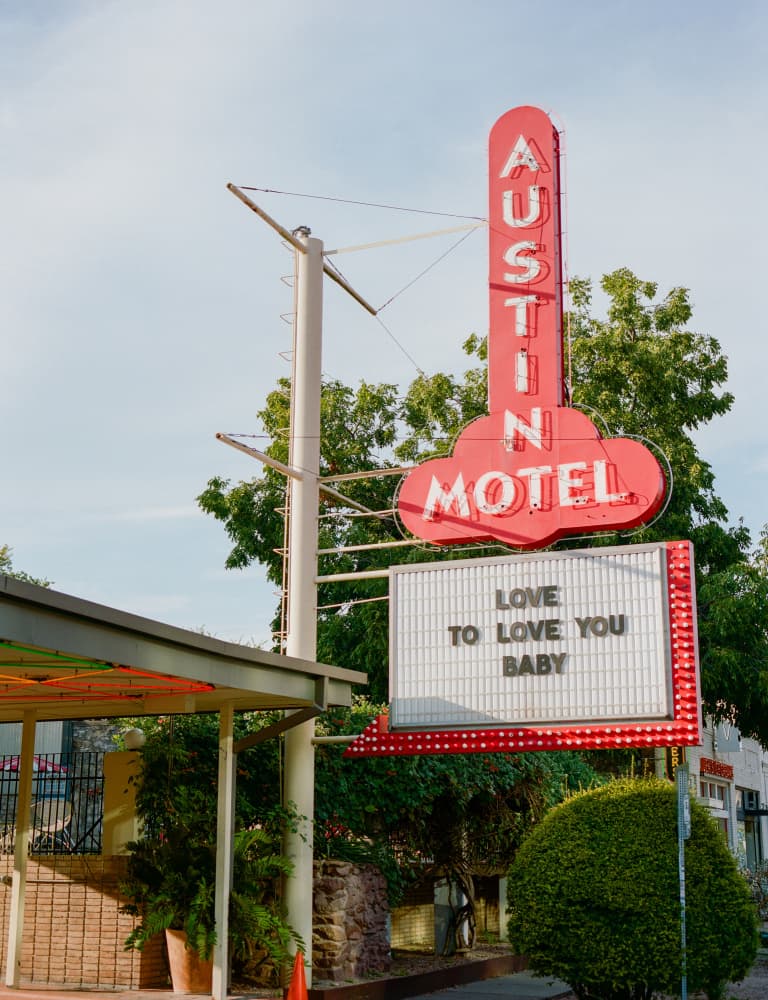 Austin Motel Neon Sign by Bethany Young — canvas wall art