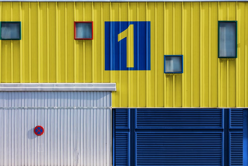 Yellow Blue Geometric Facade by Jois Domont ( J.L.G.) — canvas wall art