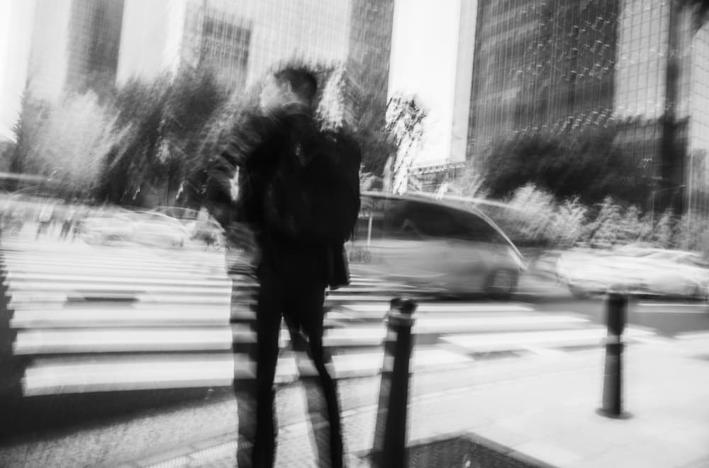 Blurred City Walker by Swen MUN — canvas wall art