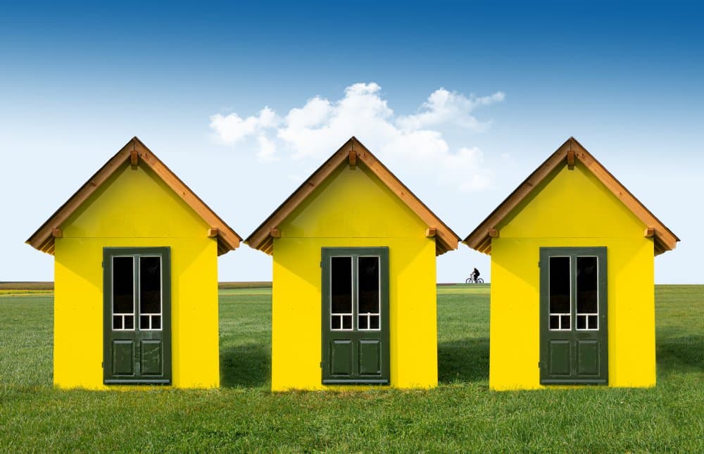 Idyllic Yellow Homes by Anette Ohlendorf — canvas wall art