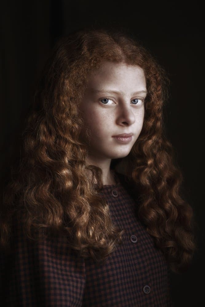 Pensive Redhead Girl by Emel Sefer — canvas wall art