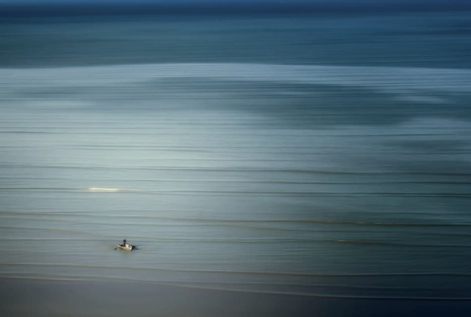 Lone Boat Serenity by Cie Shin — canvas wall art