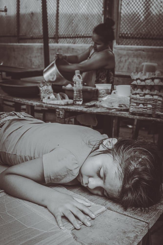 Sleeping Child Working Woman by Koji Morishige — canvas wall art