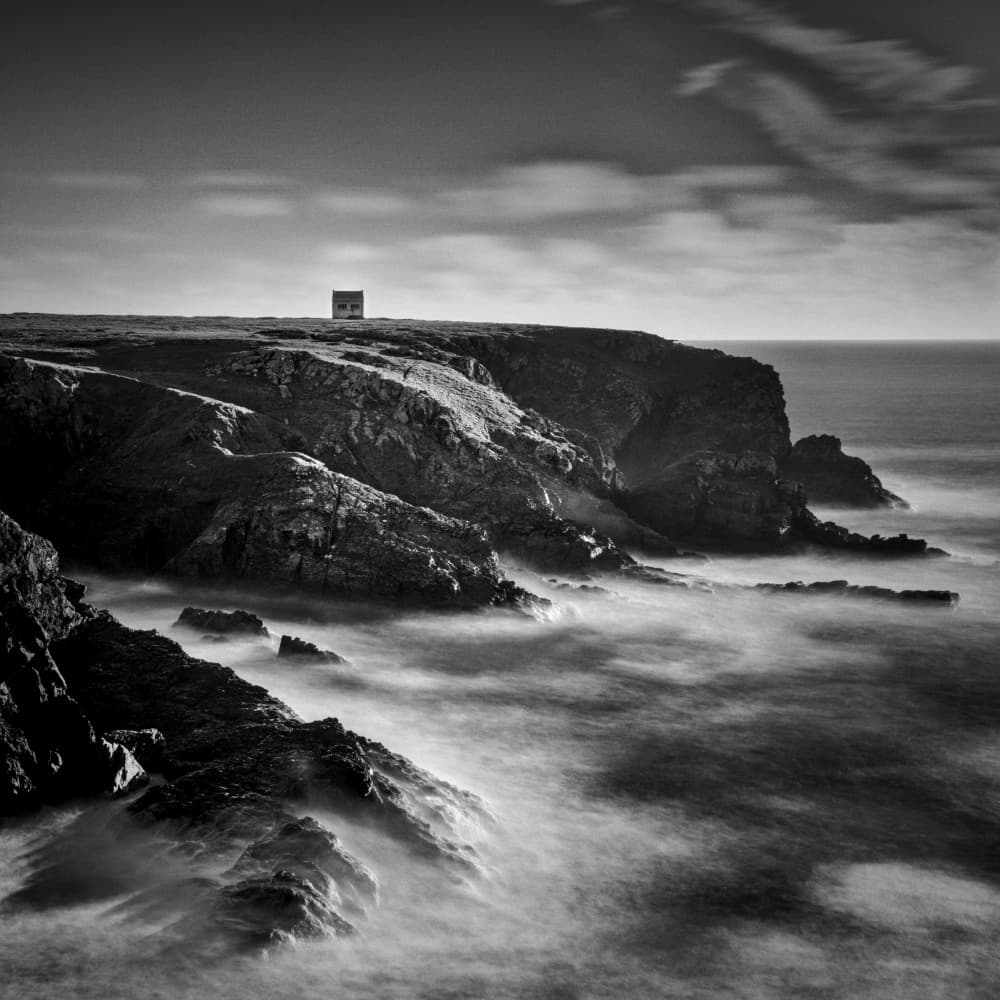 Misty Cliffside Building by av peteghium — canvas wall art